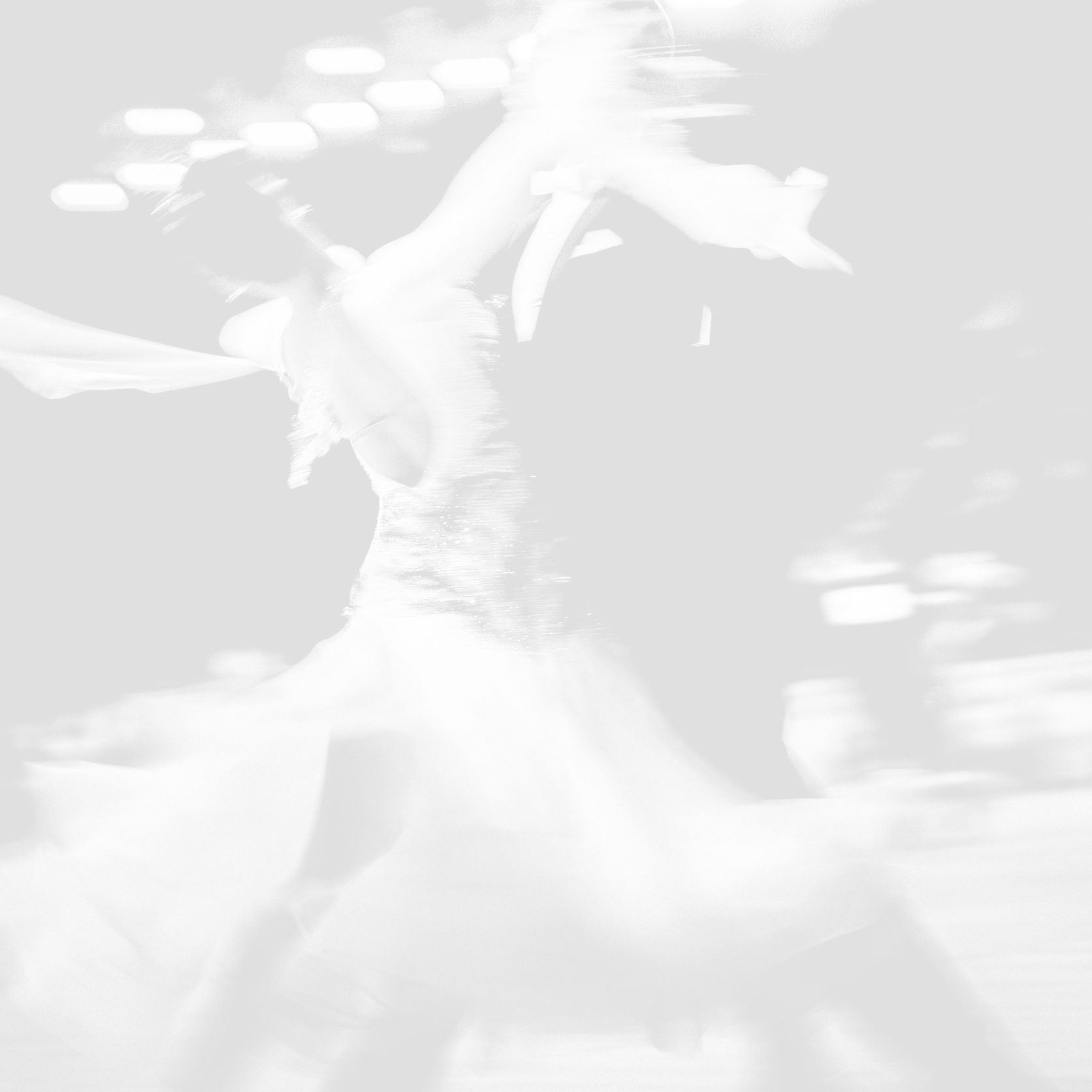 76368791 - blurred couple dancers competition in ballroom dancing. black and white image